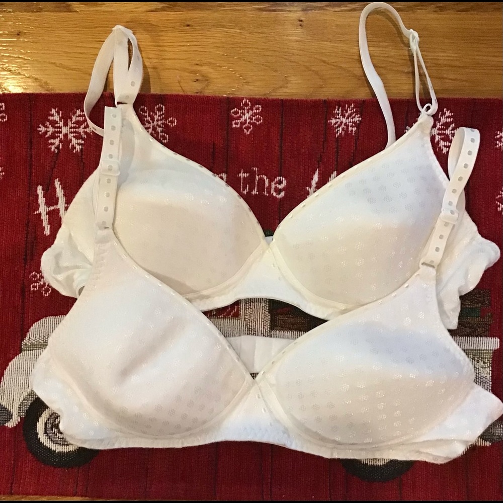 A total of two woman’s size 36B white best form bras